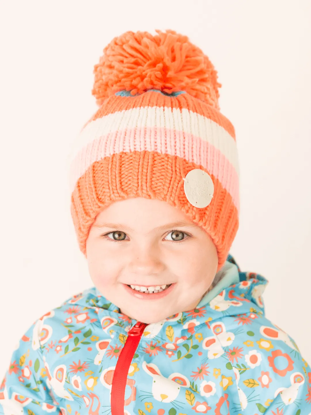 Coral and Cream Striped Bobble Hat