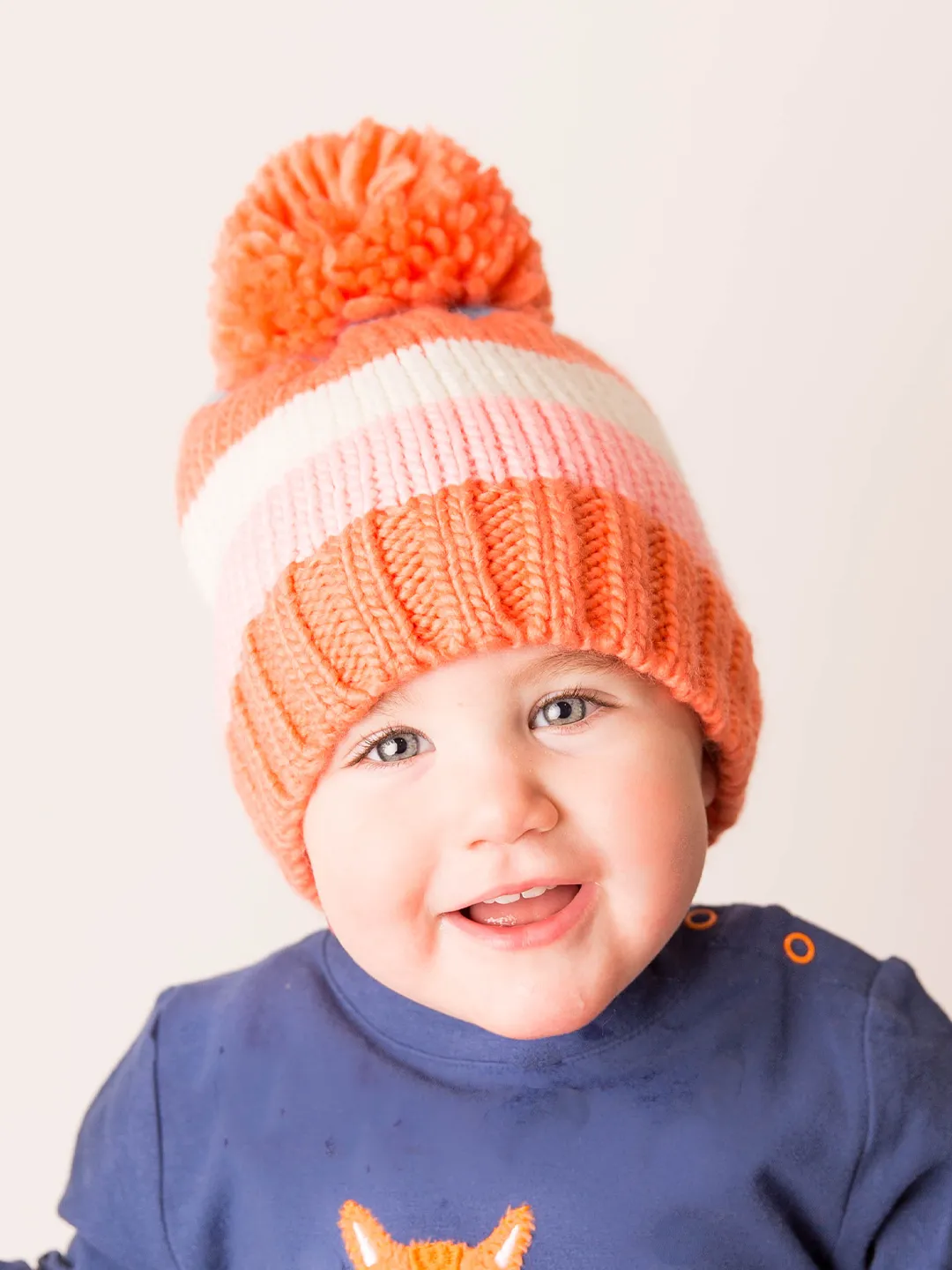 Coral and Cream Striped Bobble Hat